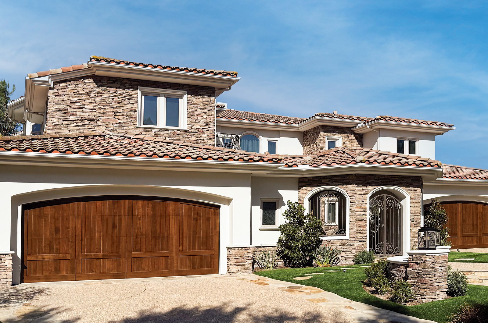 Modern Spanish style custom wood garage door